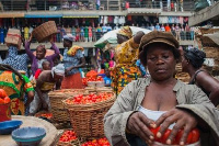 Traders in a market | File photo