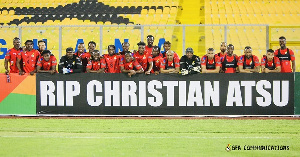 The Black Stars players paying a tribute to Christian Atsu