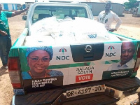 NDC branded vehicle conveying the bags of sugar