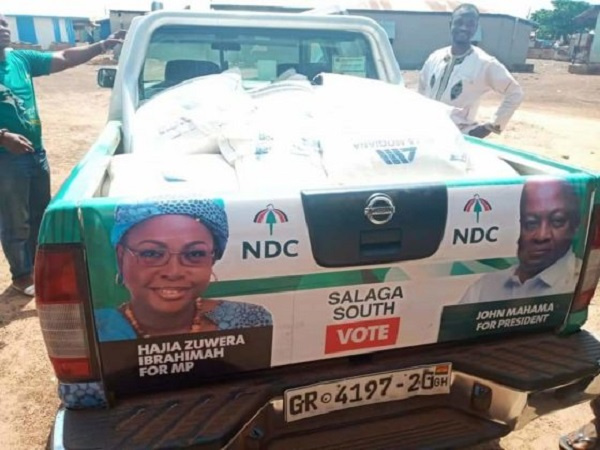 NDC branded vehicle conveying the bags of sugar