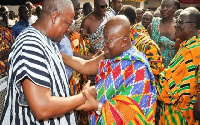 President John Mahama in a handshake with Nana Akufo-Addo