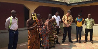 Some elders of Damang pouring libation