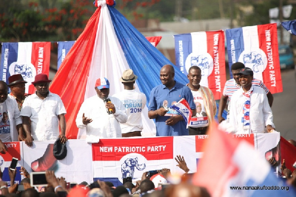 Nana Akufo-Addo with other NPP members addressing electorates during a campaign