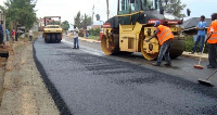 Workers on the Teshie-La beach road