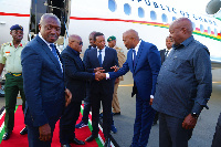 Akufo-Addo greets Kenyan minister after descending from the presidential jet