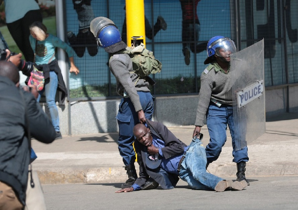 Police controlling riot