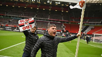 Some protestors at the Old Trafford stadium