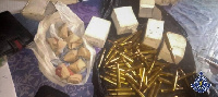 The suspects were arrested for illegally possessing ammunition and narcotics