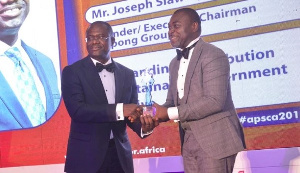 Dr Agyepong Siaw receiving his award