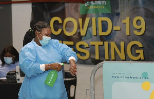 Official at a COVID-19 testing center | File photo