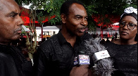 Two of coach Addo's brothers and daughter at the funeral