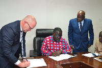 Stakeholders involved signing the documents