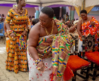 A queen mother dancing