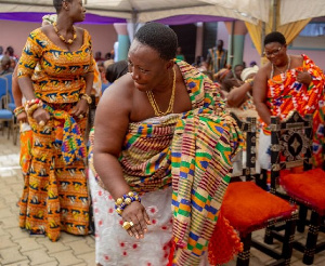 A queen mother dancing