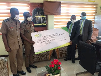 SIC Life Management presented a cheque of GH₵7,529.00 to the Fire Academy and Training School