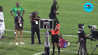 Referee Redouane Jiyed checking the VAR