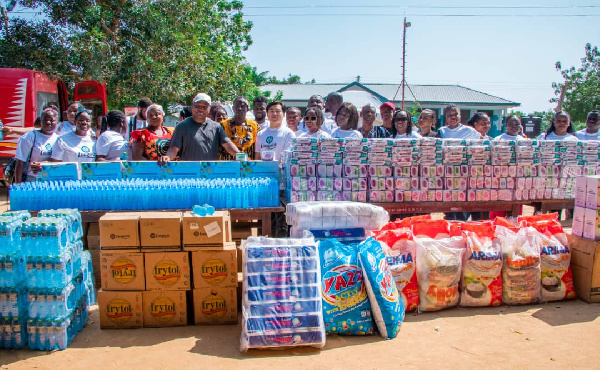 Mr Dai presenting the relief items to Mr Okudzeto Ablakwa at Mepe