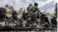 M23 soldiers leave Rumangabo camp after the meeting with EACRF officials