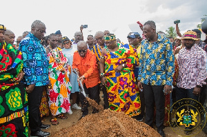 President Akufo-Addo (in orange) performing the ground breaking ceremony