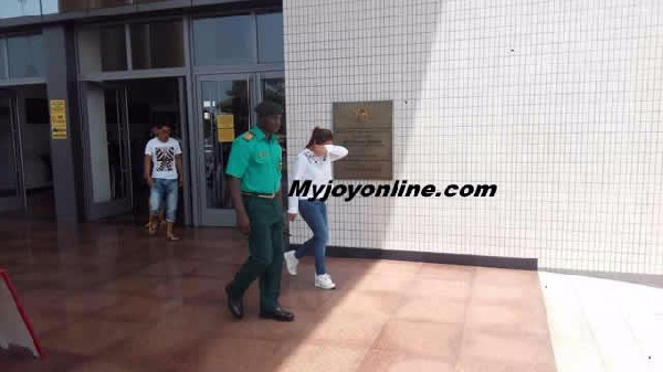 Galamsey queen Aisha Huang being escorted out of Court