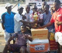 Regional Maritime University display their glittering trophy