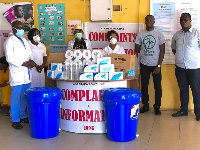 Staff of the Adabraka Polyclinic receiving the items from JarkWayne Missions