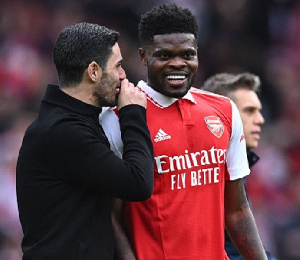 Thomas Partey and coach Mikel Arteta