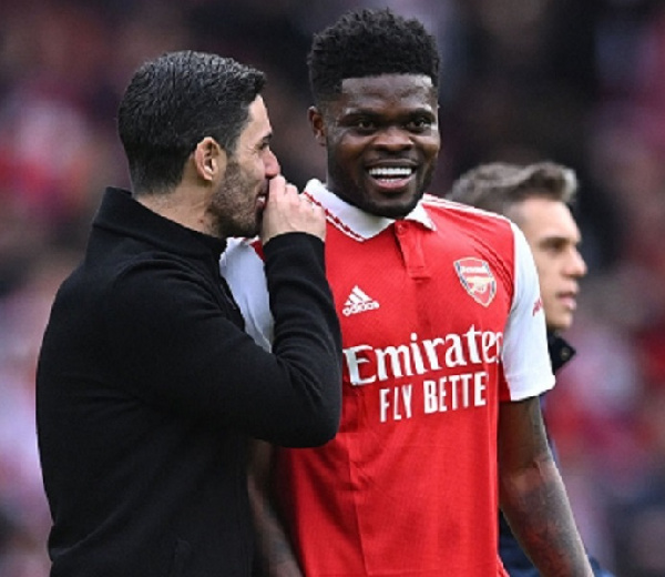 Mikel Arteta (left) and Thomas Partey