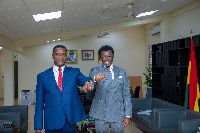 Dr. Yaw Adutwum is seen here with Cheddar during the latter's visit