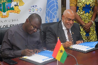 Dr. Mohammed Amin Adam and Charles Abani, UN Resident Coordinator in Ghana