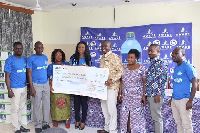 Awake officials donating GHc75,000 cheque to the management of the National Cardio Centre