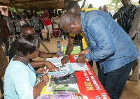 President John Dramani Mahama verifying his name