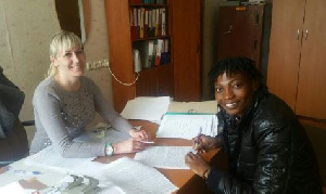 Faustina Ampah signing her contract