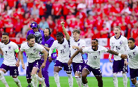 England's players celebrating after winning on penalties