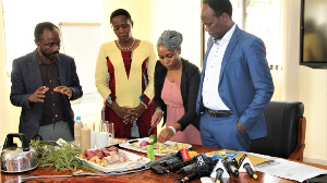 Dr Gwajima and her deputy watch as the ingredients are prepared to make a natural remedy