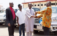 MiDA CEO, Eson-Benjamin presenting the vehicles to representatives of ECG