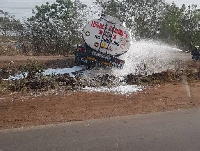 Fire service personnel trying to avert any possible explosion