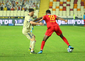 A photograph of Benjamin Tetteh on the pitch