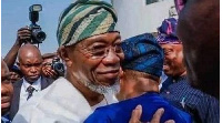 Aregbesola and Oyetola in a warm hug