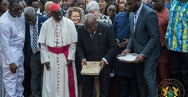 The president laying the stone for commencement of the constuction of the cathedral