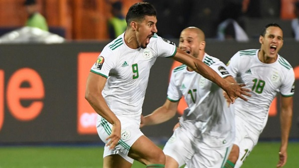 Baghdad celebrating the goal with teammates