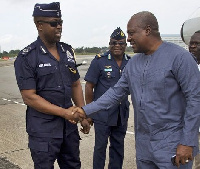 DCOP Kofi Boakye in an handshake with Prez Mahama