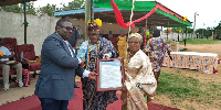 Hon. Quashigah [L] receiving his citation