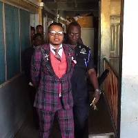 Daniel Obinim in handcuff