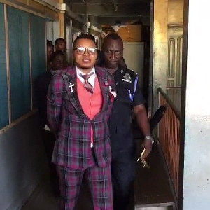 Obinim Under Arrest Handcuffed