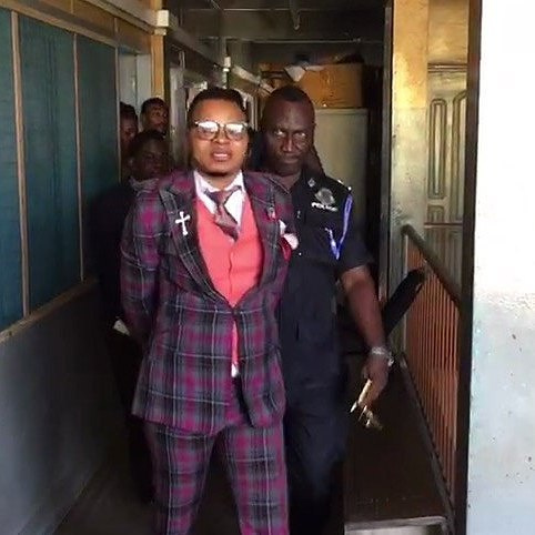 Daniel Obinim in a handcuff