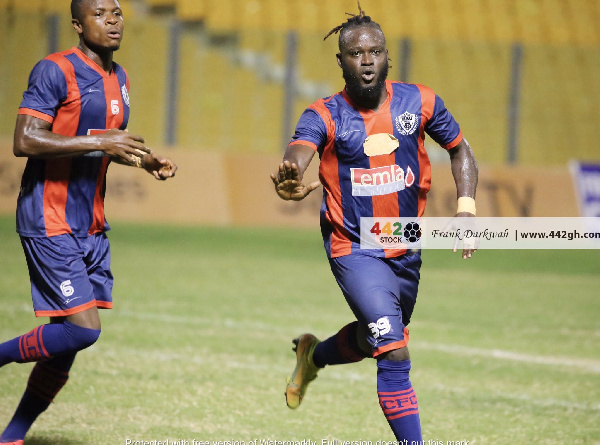 Legon Cities striker, Hans Kwofie(R)