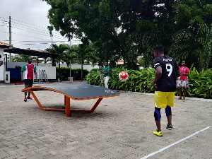 Teqball players, Samuel Aidoo and Akoto demonstrating the rules of the game to the gathering