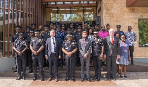 Photo of a group of Police men and some members of GIZ