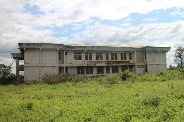 Weeds have taken over the abandoned GES office building